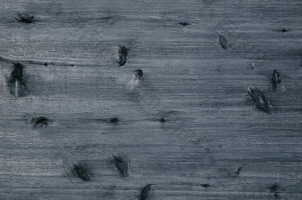 质朴的灰色单色木板背景，带节疤和纹理