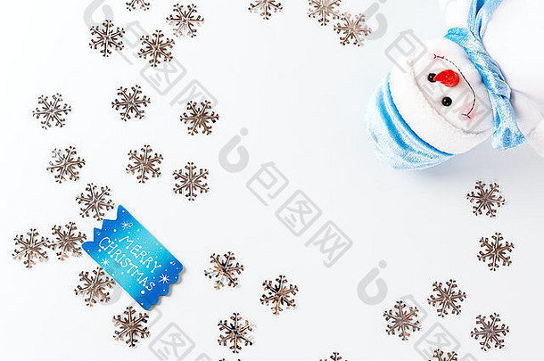 快乐圣诞节背景蓝色的问候卡可爱的雪人银雪花白色空间文本