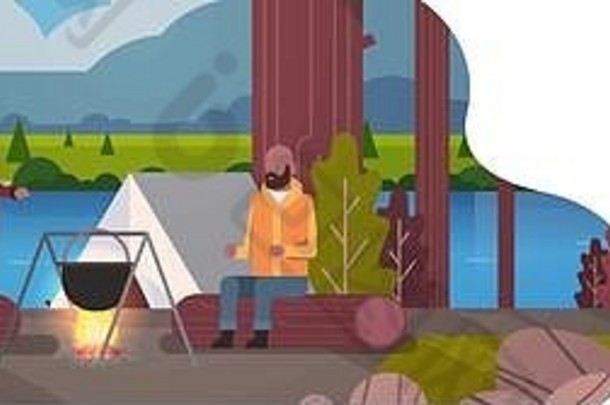 夫妇非洲美国徒步旅行者烹饪餐玩滚球的人沸腾能篝火营帐篷野营概念景观自然河山