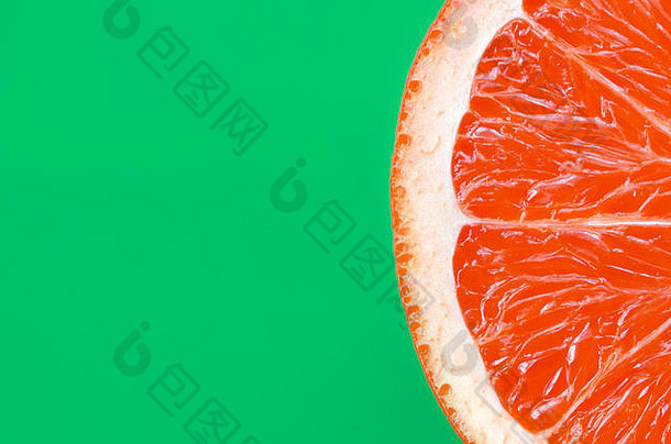 前视图葡萄柚片明亮的背景绿色颜色饱和柑橘类纹理图像
