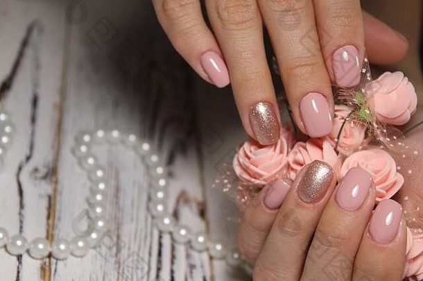 美丽的粉红色的修指甲指甲背景时尚纹理