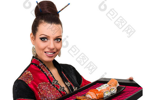 穿着传统服装搭配东方食物的女人