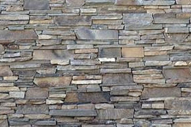 现代模式平石头墙装饰表面棕色（的）颜色石头排花岗岩墙面对石头岩石