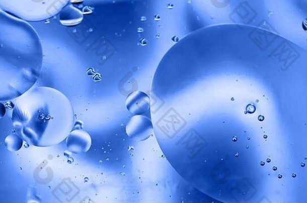 散焦摘要背景图片使石油水肥皂蓝色的健美的