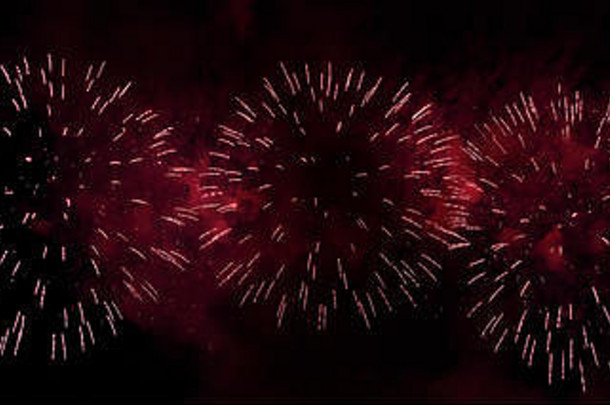 彩色烟火，背景为波基色，带有用于庆祝新年的空间，抽象节日背景