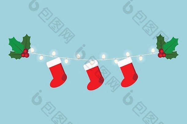 美丽的圣诞节加兰发光的灯红色的袜子用钉子钉上槲寄生孤立的蓝色的背景