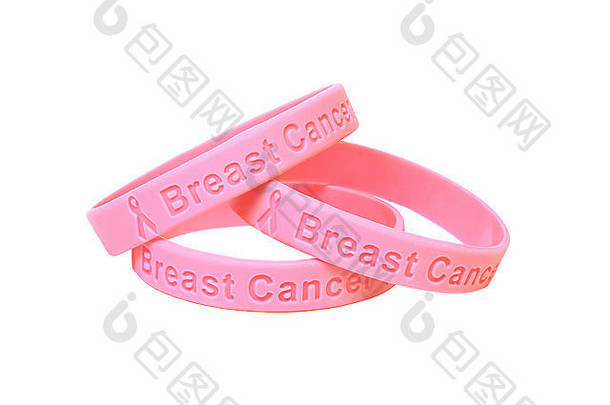 两个粉色的普通手镯，用于提高乳腺癌意识。在白色上使用空间。