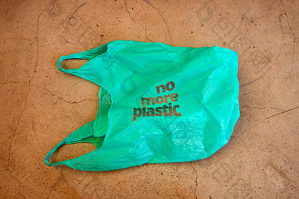 塑料环境意识护理辩护拍摄显示绿色塑料袋的座右铭塑料