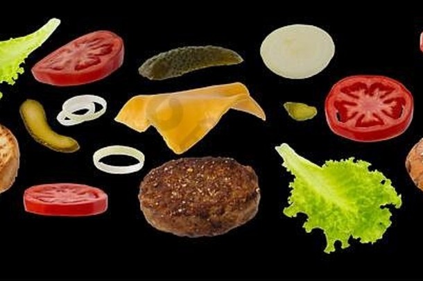 飞行汉堡成分孤立的黑色的背景食物悬浮概念快食物产品