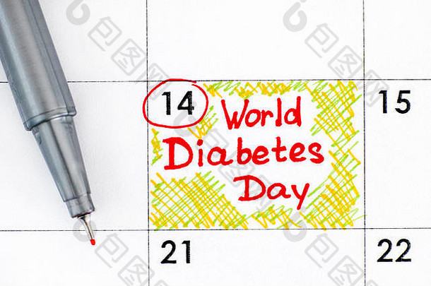用红笔在日历上提醒世界糖尿病日。十一月十。