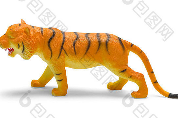 白色背景上隔离的塑料老虎玩具侧视图。