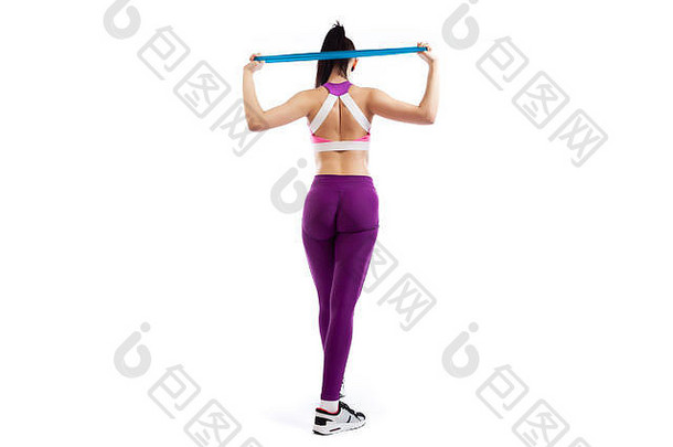 黑头发的女人教练运动紫色的短前健身房紧身裤锻炼回来手头繁殖体育运动健身摩擦