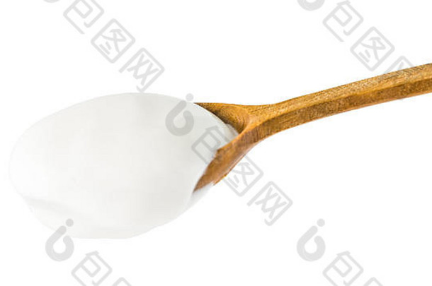 木勺上的白色酸奶