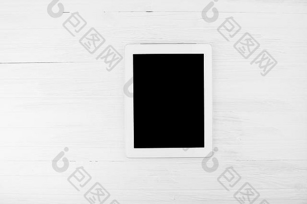 大黑色的空屏幕聪明的平板电脑设备白色框架白色木背景前角