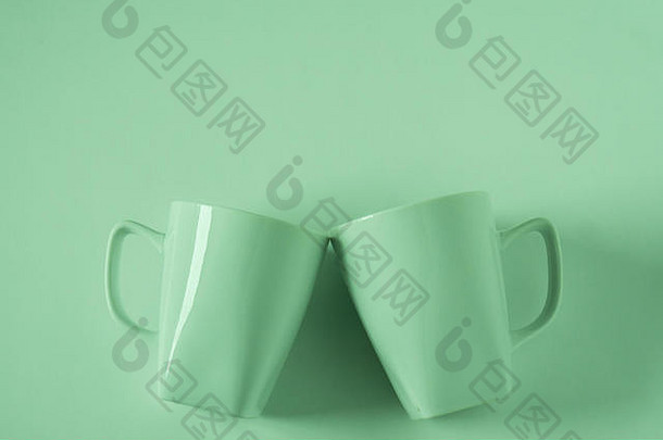 单色绿色咖啡杯子绿色背景无比的干杯空白空房间空间文本复制Copyspace现代前视图与