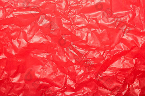 起皱的红色塑料板作为背景或文本。