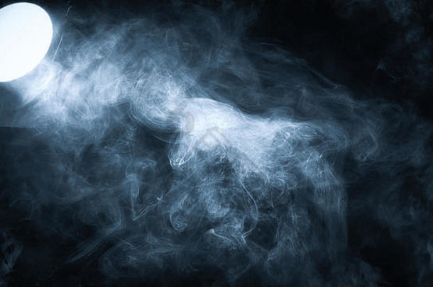 健美的蓝色的投影仪黑色的背景雾有雾的效果电影