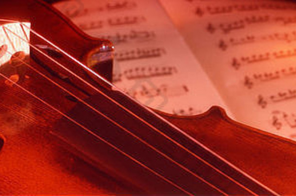小提琴细节孔烦恼字符串弓音乐音乐的字符串音乐的仪器