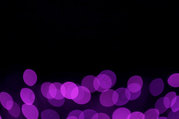 模糊散景散焦紫色的光黑暗摘要背景黑色的免费的空间文本设计