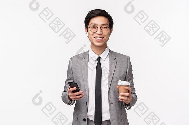 办公室工人业务生活方式概念半身照肖像成功的年轻的亚洲商人西装无线耳机持有