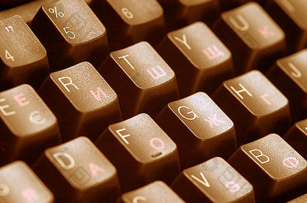 棕色（的）扣黑色的电脑键盘键沟通计算技术字母按钮命令按钮巧克力