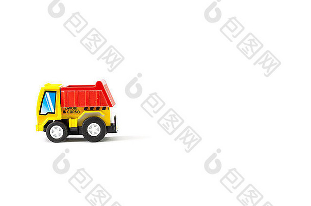 地球运动玩具。黄色和红色的卡车。