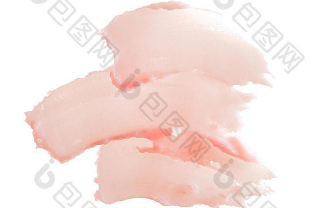 精致的粉红色纹理和白色背景上化妆面膜或面霜的笔触