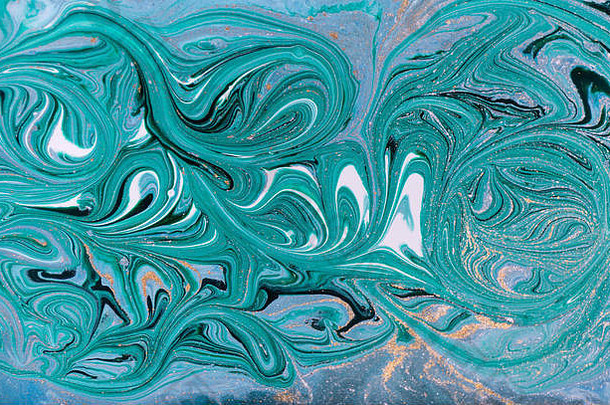 大理石抽象丙烯酸背景。自然蓝绿色大理石花纹艺术品纹理。金光闪闪。