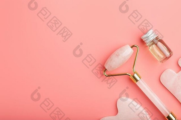 洞穴sha按摩工具使自然粉红色的quartz-roller玉石头石油粉红色的背景脸身体护理部分传统的中国人