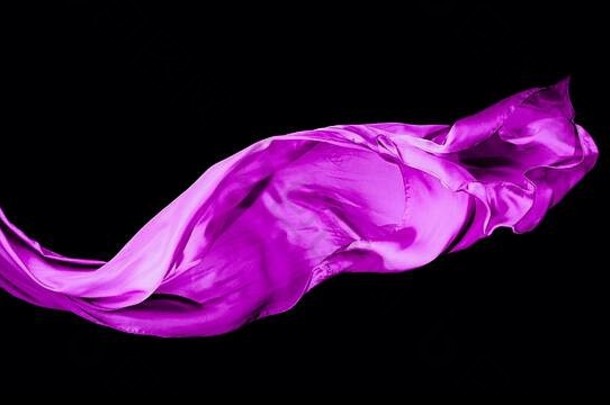 光滑的优雅的紫色的透明的布孤立的黑色的背景纹理飞行织物