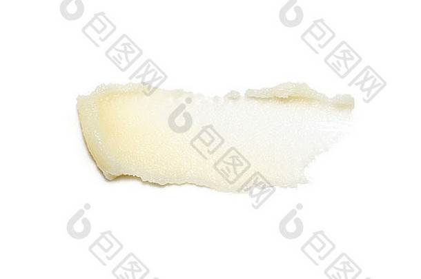 米黄色身体磨砂膏，剪在白色背景上