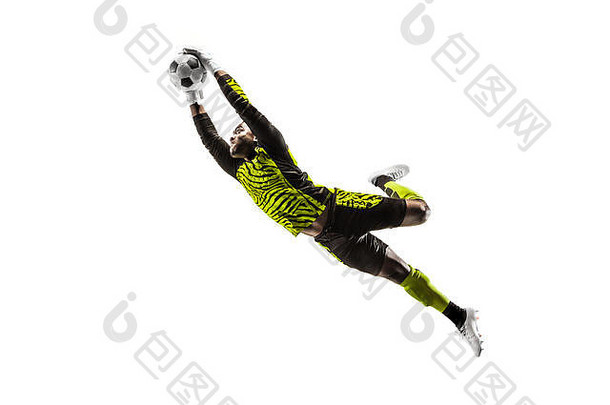 男足球运动员守门员在跳跃中接球。白色工作室背景上的健身男子与球隔离的剪影