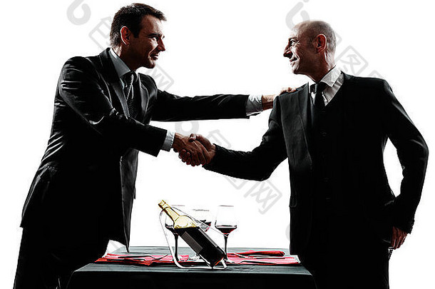 两名商人在白色背景下以剪影握手