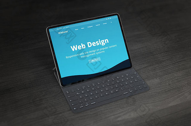 网络设计工作室促销网络网站平板电脑键盘办公室桌子上响应网络设计促销活动概念