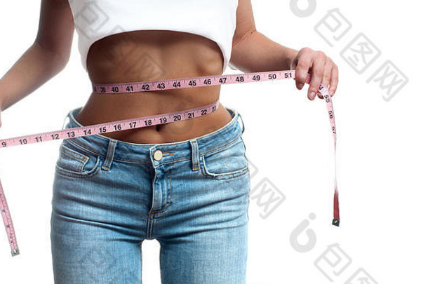 女人测量腰重量损失饮食概念