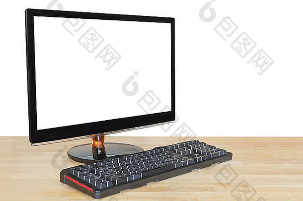 电脑黑色宽屏显示器的侧视图，带有镂空屏幕和键盘，位于白色背景上的木桌上