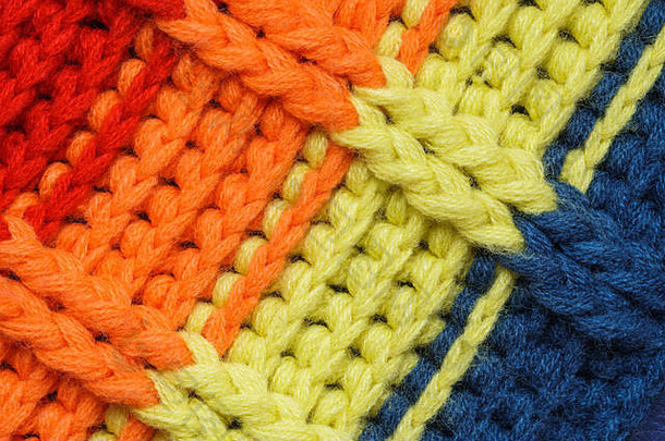 五彩缤纷的针织品毛衣织物纹理明亮的饱和背景