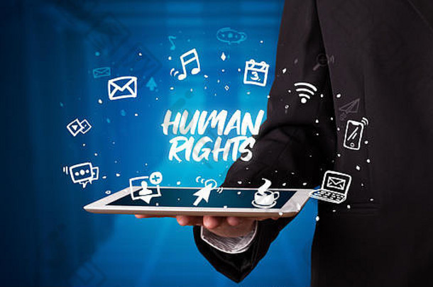 年轻的业务人工作平板电脑显示登记人类权利