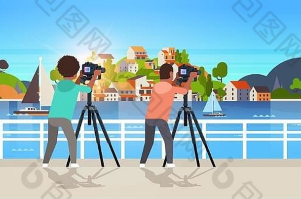 旅行摄影师采取自然图片山城市岛非洲美国人数码单反相机相机三脚架景观背景水平