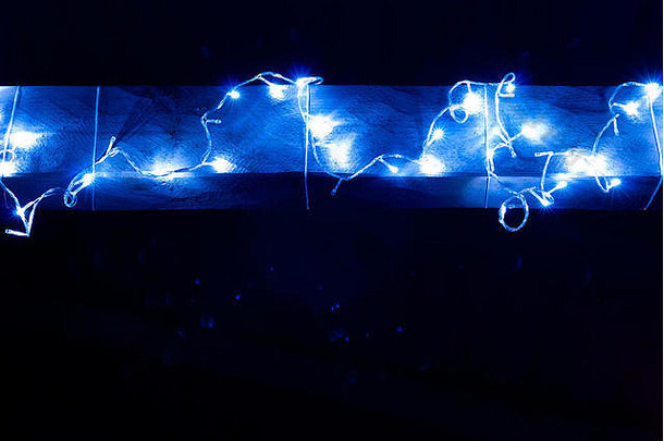 圣诞节故事木梁装饰灯闪亮的蓝色的颜色