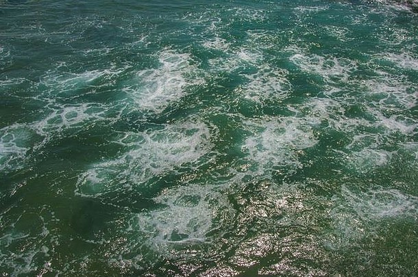 海纹理美丽的绿松石水波白色泡沫强大的自然概念完整的框架海洋