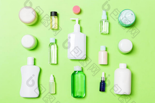 集团塑料身体护理瓶平躺作文化妆品产品<strong>绿色背景</strong>空空间设计集白色化妆品与