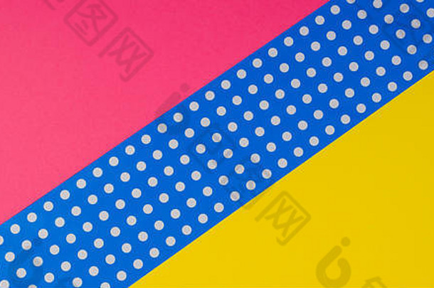 摘要几何黄色的粉红色的蓝色的波尔卡点纸背景