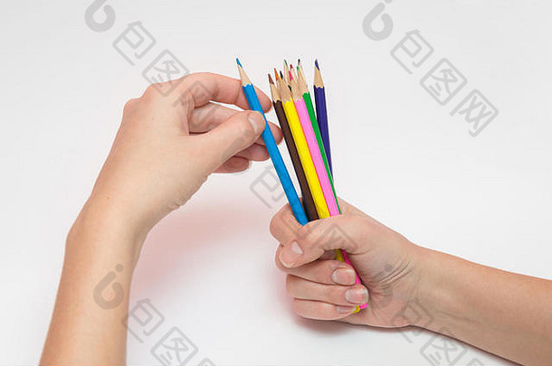 女手持有拳头打铅笔手选择想要的颜色