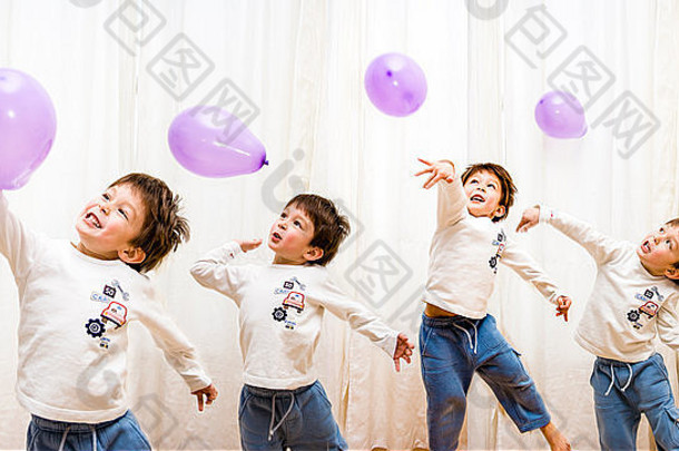 高加索人孩子男孩玩在室内紫色<strong>气球</strong>一年<strong>打气球</strong>背景白色窗帘图片蒙太奇