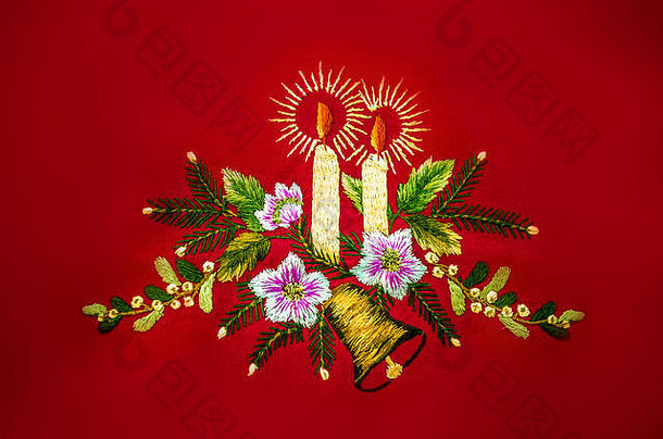 圣诞节燃烧蜡烛贝尔花绣花缎针红色的背景