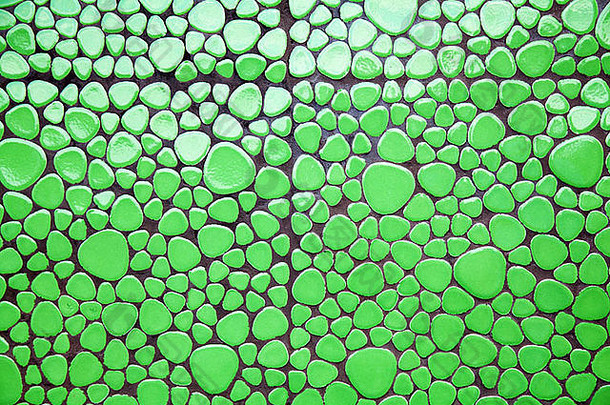 绿色价格不同形状马赛克瓷砖背景