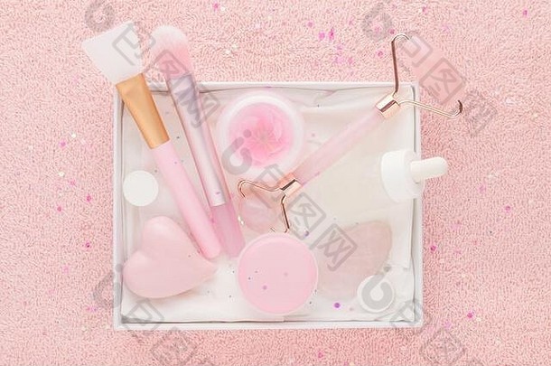美盒子玫瑰石英玉辊石头脸血清刷柔和的粉红色的背景