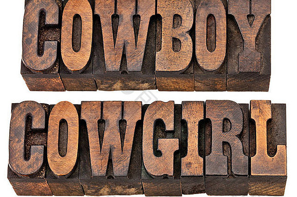 牛仔女牛仔孤立的单词古董凸版印刷的木类型法国克拉伦登字体。