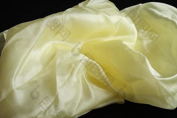 光滑的闪亮的黄色的丝绸手帕